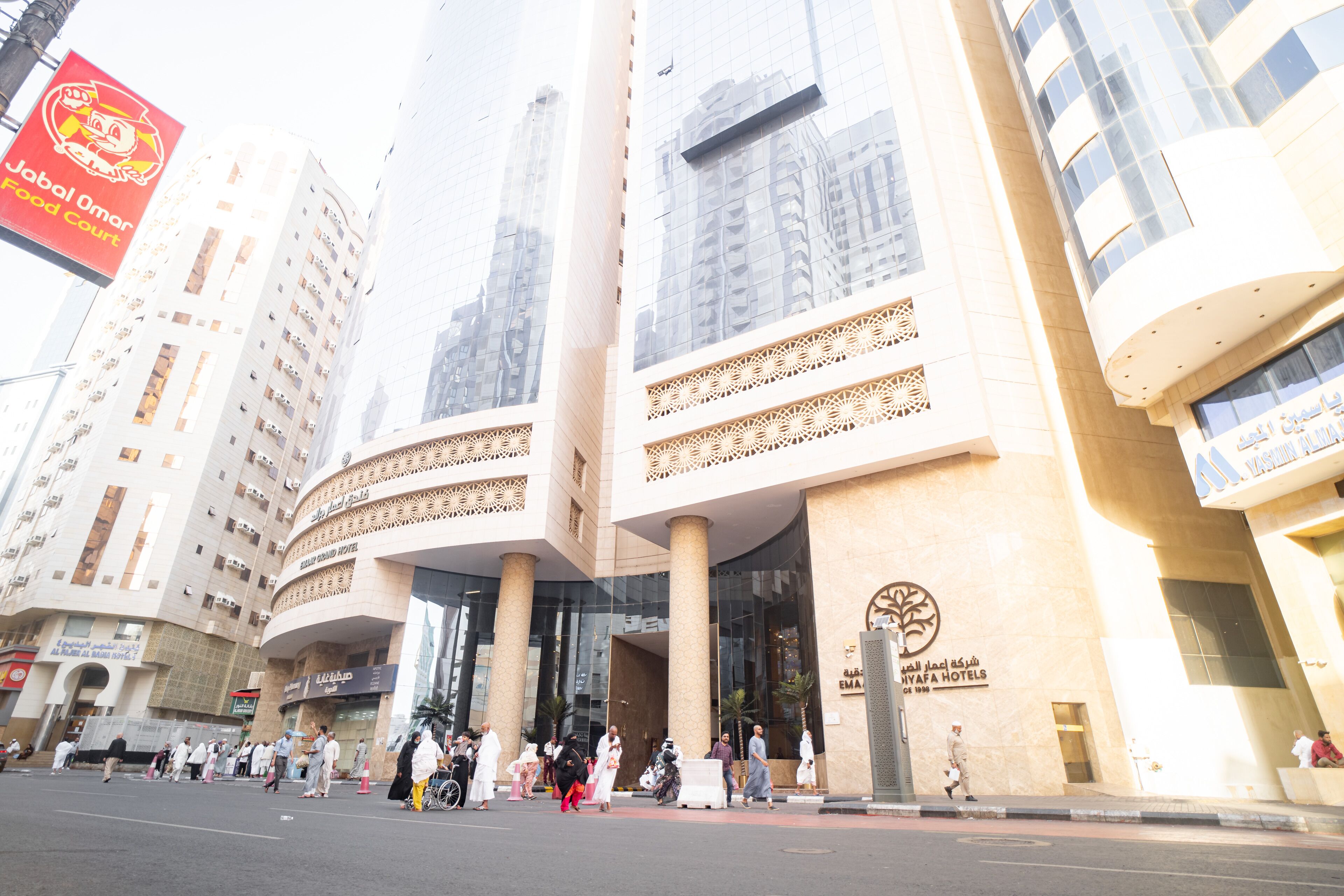 A hotel with a modern design, featuring large columns and a prominent entrance.