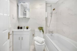 Hair dryer, towels, toilet paper