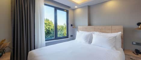 1 phòng ngủ, bộ đồ giường cao cấp, minibar, két bảo mật tại phòng