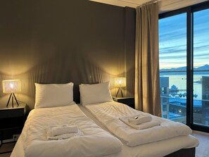 Appartement Deluxe | Couette en duvet, décor unique, ameublement unique