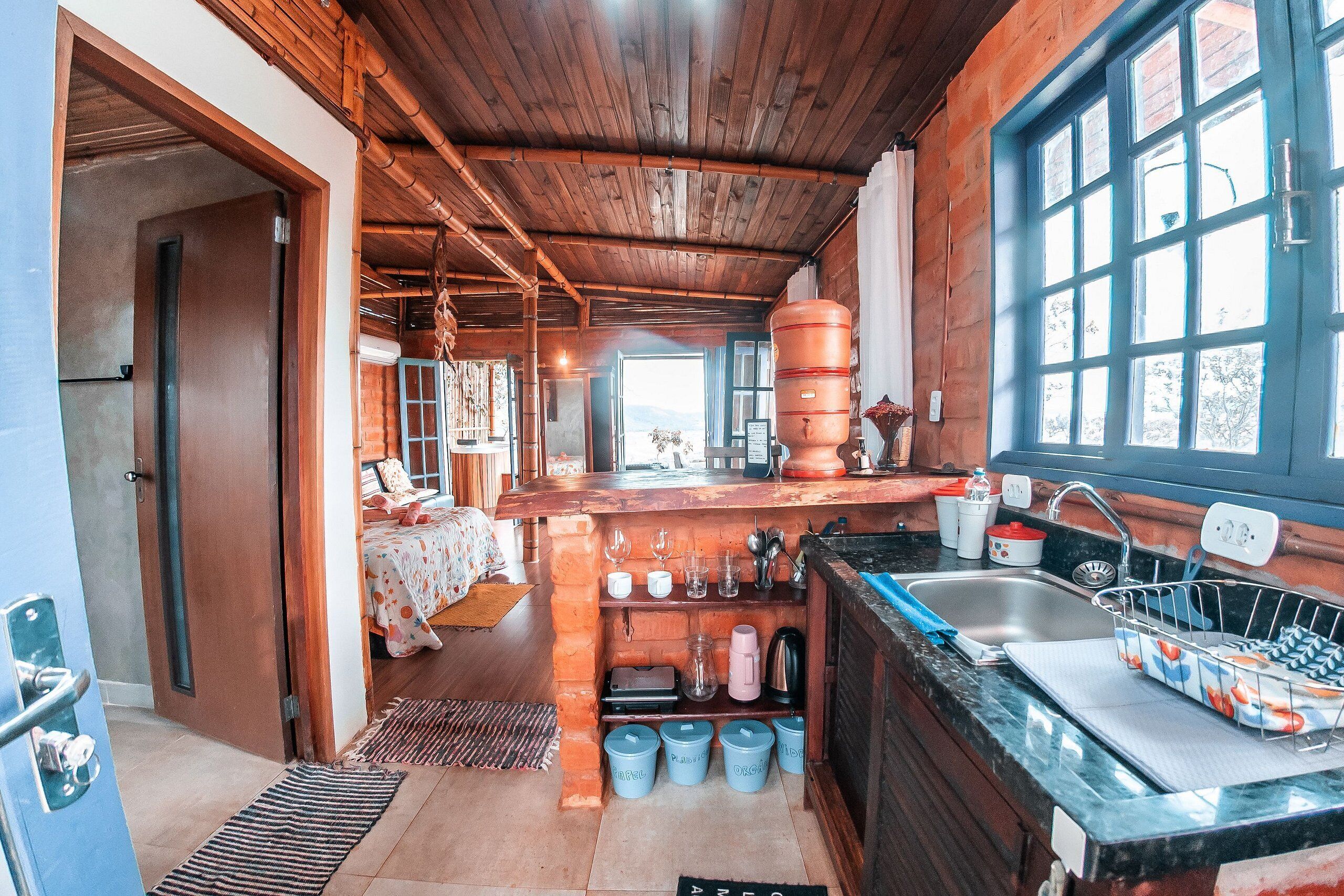 Bungalow | Private kitchen | Full-size fridge, oven, blender, griddle