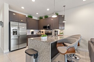 Fridge, oven, coffee/tea maker, toaster