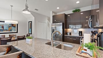 Townhome, 3 Bedrooms | Private kitchen | Fridge, oven, coffee/tea maker, toaster