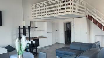 Suite estudio Grand | Minibar, wifi gratis y ropa de cama