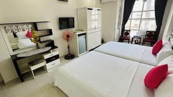 City Quadruple Room | Premium bedding, pillowtop beds, minibar, in-room safe