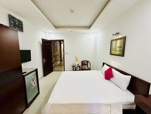 Habitación doble estándar | Ropa de cama de alta calidad, camas con pillow-top y minibar 