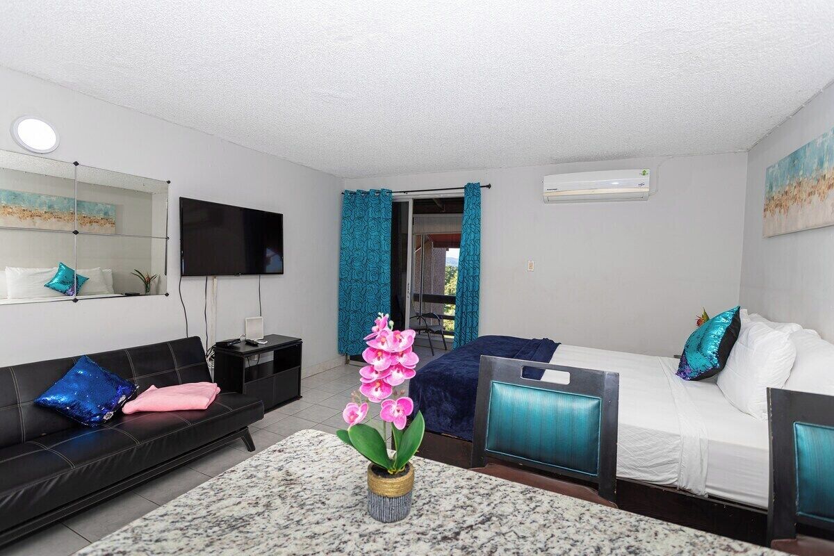 Standard Studio, Partial Ocean View | In-room safe, laptop workspace, blackout drapes, soundproofing