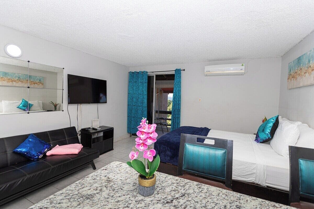 Standard Studio, Partial Ocean View | In-room safe, laptop workspace, blackout drapes, soundproofing