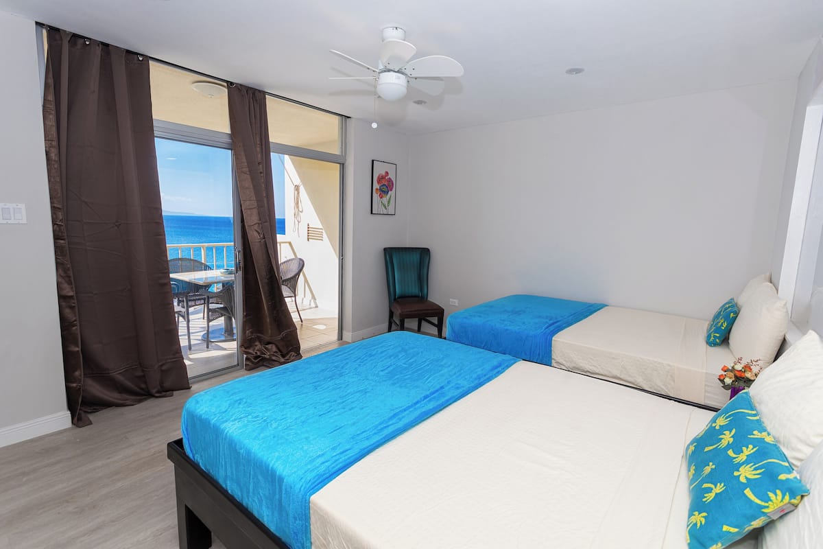 Family Apartment, 2 Bedrooms, Sea View, Tower | Egyptian cotton sheets, premium bedding, in-room safe, laptop workspace