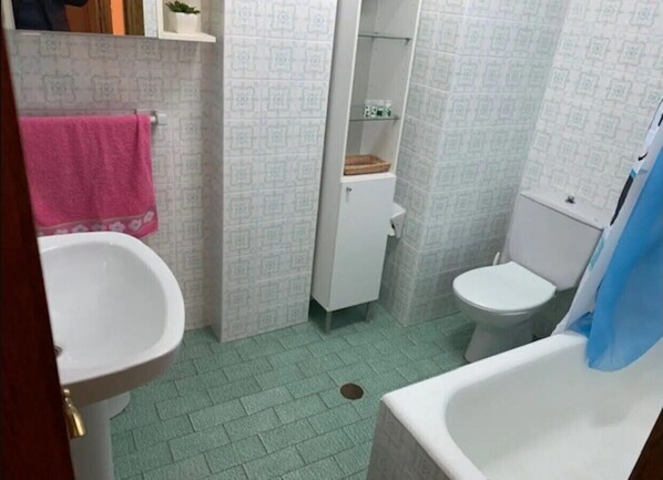Hair dryer, towels, soap, toilet paper