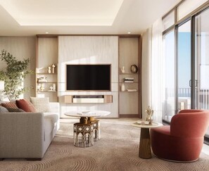 A modern living room with a flat-screen TV, a sofa, a red armchair, and a coffee table.