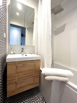 Hair dryer, towels, soap, toilet paper