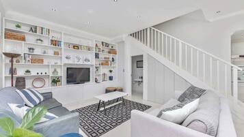 Basic House, Multiple Beds | Living area | TV