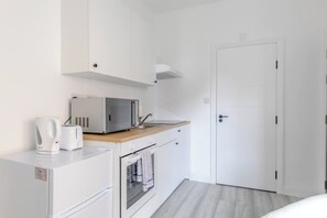 Apartamento básico, 1 cama King | Parte interna