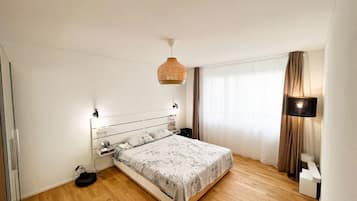 Apartamento, 1 cama Queen e sofá-cama | 2 quartos, Wi-Fi de cortesia, roupa de cama