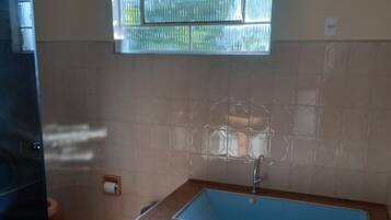 Shower, towels, soap, toilet paper