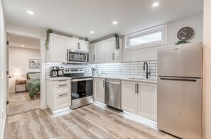 Private kitchen - Cozy Ridge Retreat 2 Bedroom 
King/Queen/Pacman Arcade Machine/Fireplace (Cochrane)