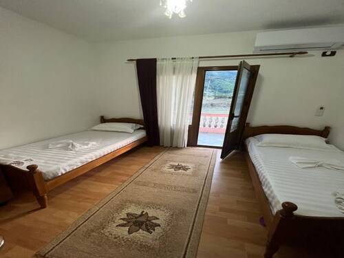 Guesthouse Space in Përmet provides accommodations with a garden.