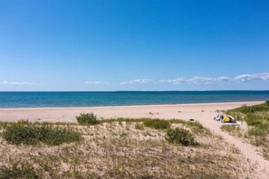 On the beach, sun-loungers