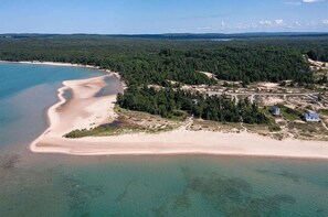 On the beach, sun-loungers