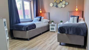 Comfort Apartment | 1 bedroom, free minibar items, in-room safe, individually decorated