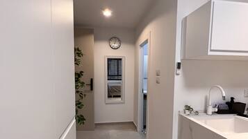 City Studio | Living area | 50-inch Smart TV with digital channels, streaming services
