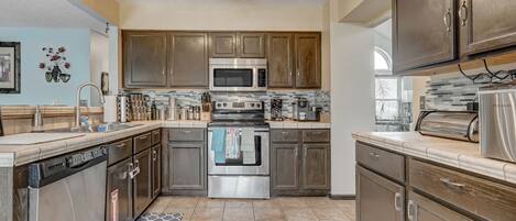 Full-sized fridge, microwave, oven, dishwasher