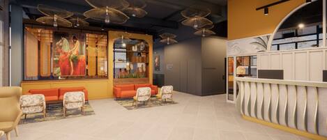 A lobby with seating, a reception desk, and decorative ceiling fans.