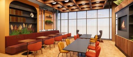 A modern interior with a long table, multiple chairs, a sofa, and a bookshelf.