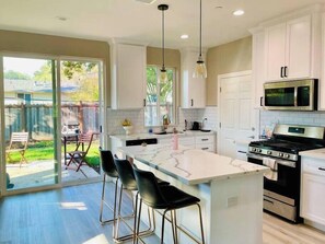 Fridge, coffee/tea maker, cookware/dishes/utensils - Modern, Spacious home with a private yard (Sacramento)