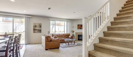 TV, fireplace, books