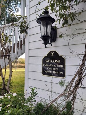 A welcome sign for Collier-Casey Estate, circa 1874, located in Captain's Quarters.