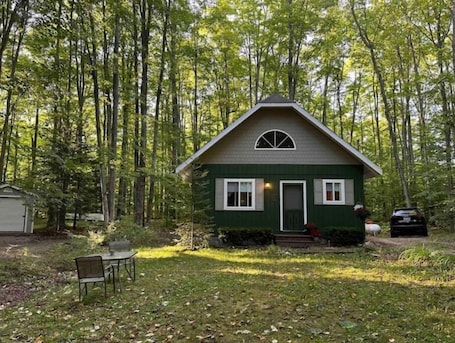 Exterior. Horn HideAway: Wooded Cabin Retreat, Fire Pit, Lake Fun, Cozy, Sleeps 8, Pets!