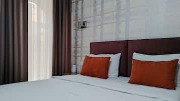 In-room safe, desk, blackout curtains, soundproofing
