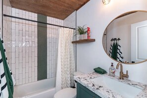 Hair dryer, towels, soap, shampoo