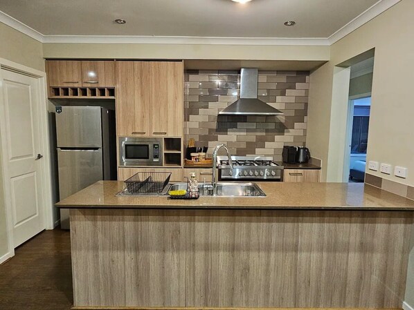 Fridge, microwave, oven, stovetop - Tranquil home in Point Cook. (Point Cook)