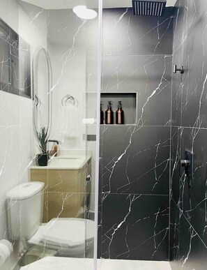 Shower, hair dryer, towels, soap