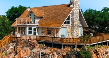 Lovely 2-story home with upper & lower decks, gorgeous lake & Hill Country views