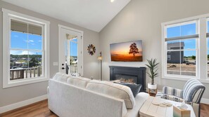 TV, fireplace - Welcome to A View to A Chill | Navvy Town Duplex (Ottawa)