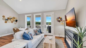 TV, fireplace - Welcome to A View to A Chill | Navvy Town Duplex (Ottawa)