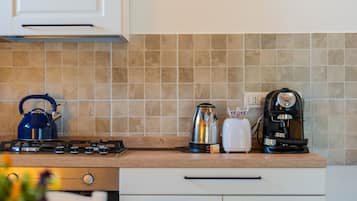 Microwave, oven, stovetop, coffee/tea maker