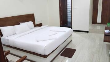 Deluxe Room | 1 bedroom, Select Comfort beds, desk, free WiFi