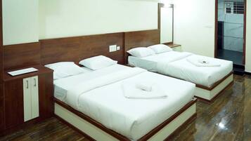 Deluxe Quadruple Room | Select Comfort beds, desk, free WiFi, bed sheets