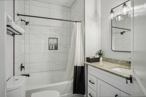 Shower, hair dryer, towels, soap