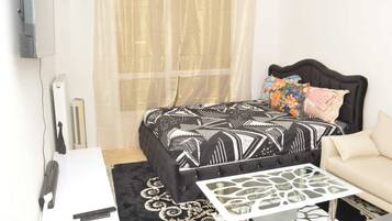 1 chambre, fer et planche à repasser, Wi-Fi, draps fournis