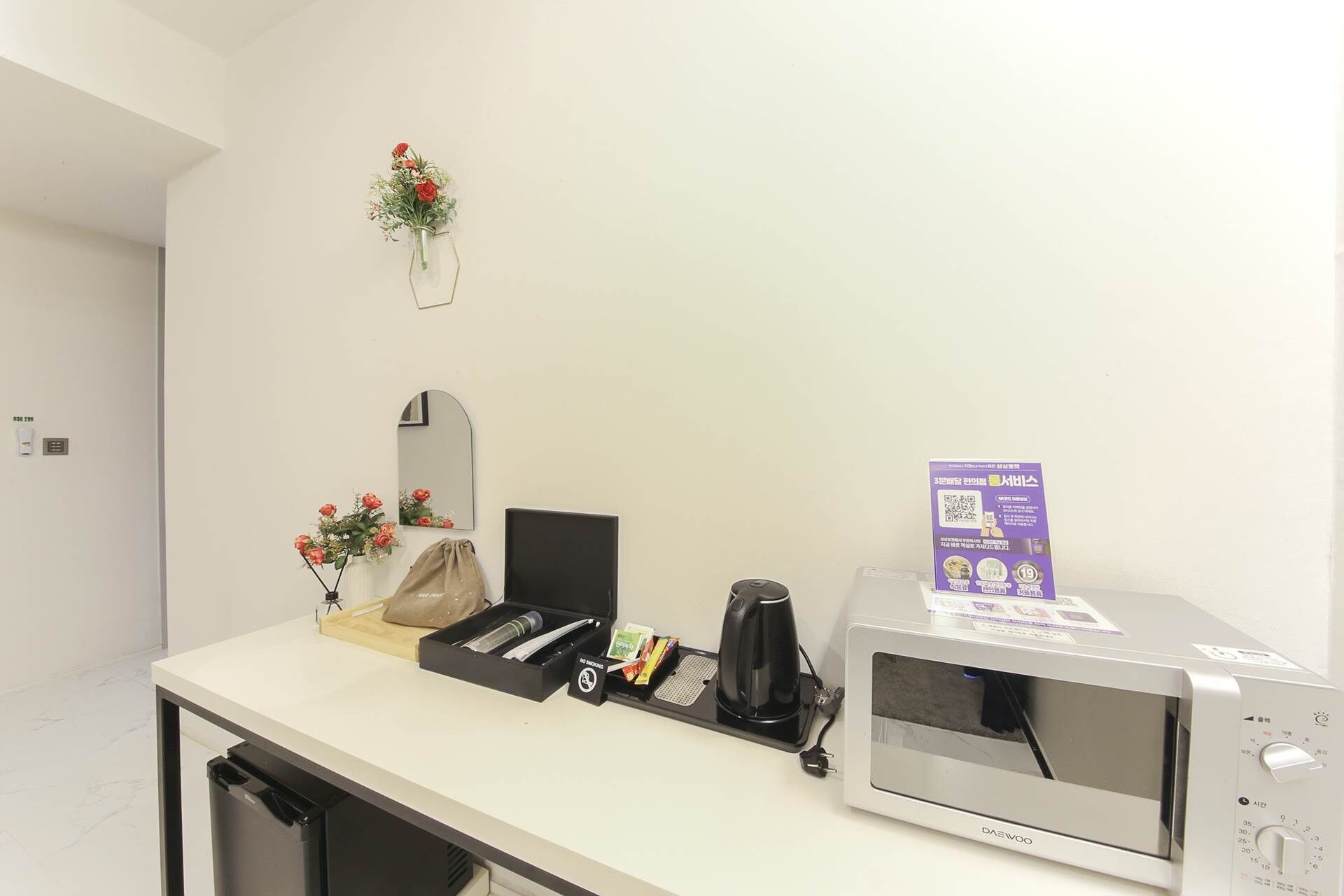 family twin room | living area | 50-inch flat-screen tv with cable channels, netflix, pay films