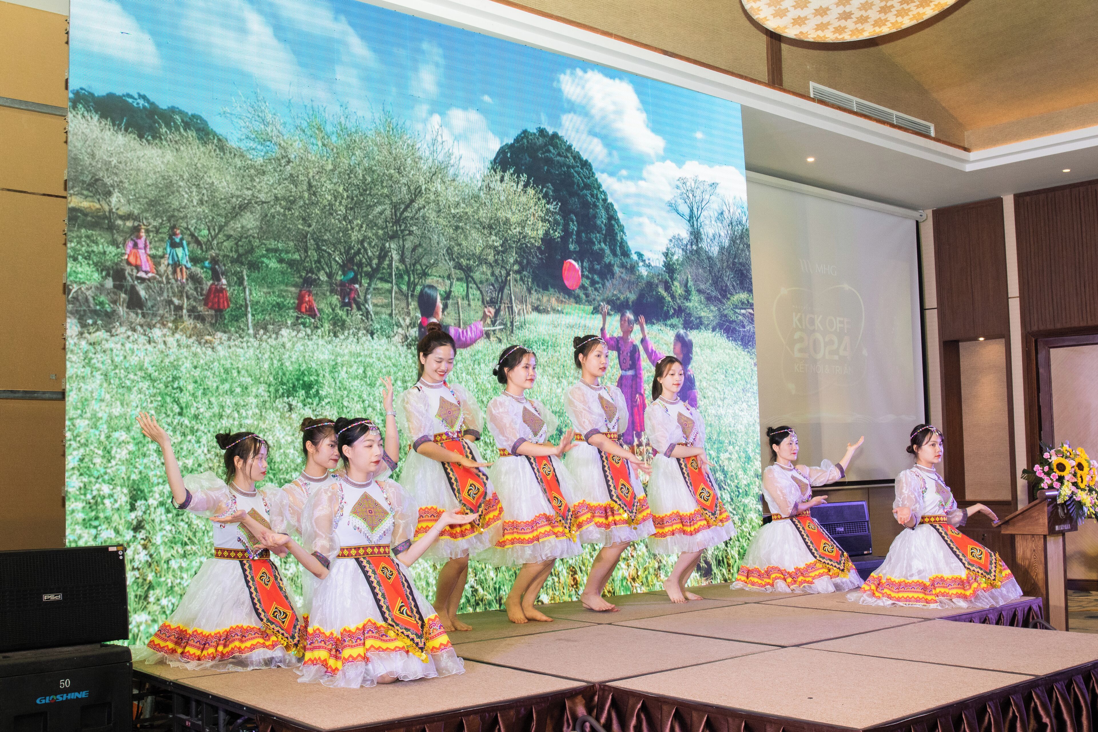 A stage with performers in traditional costumes.