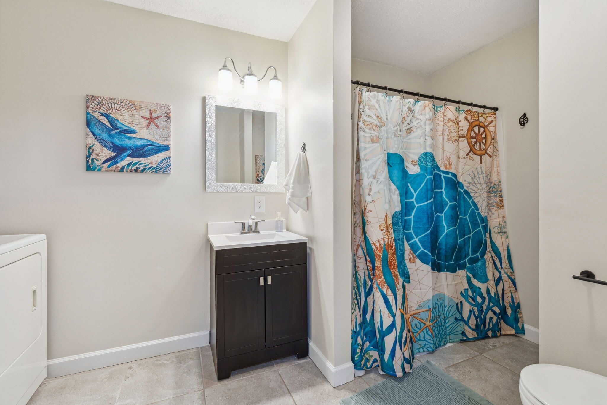 Bathtub, hair dryer, towels