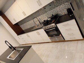 Fridge, microwave, oven, electric kettle