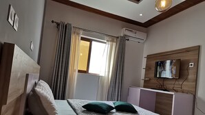 2 عدّة غرف نوم ومكواة/لوح كي وواي فاي مجانًا وملاءات أسرّة